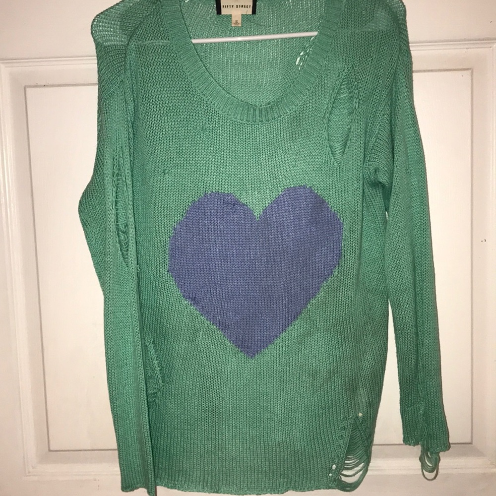 Cute sweater with intentional holes